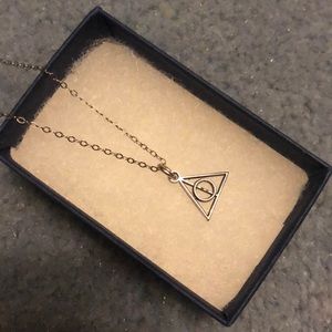 Itty bitty Harry Potter deathly hallow necklace